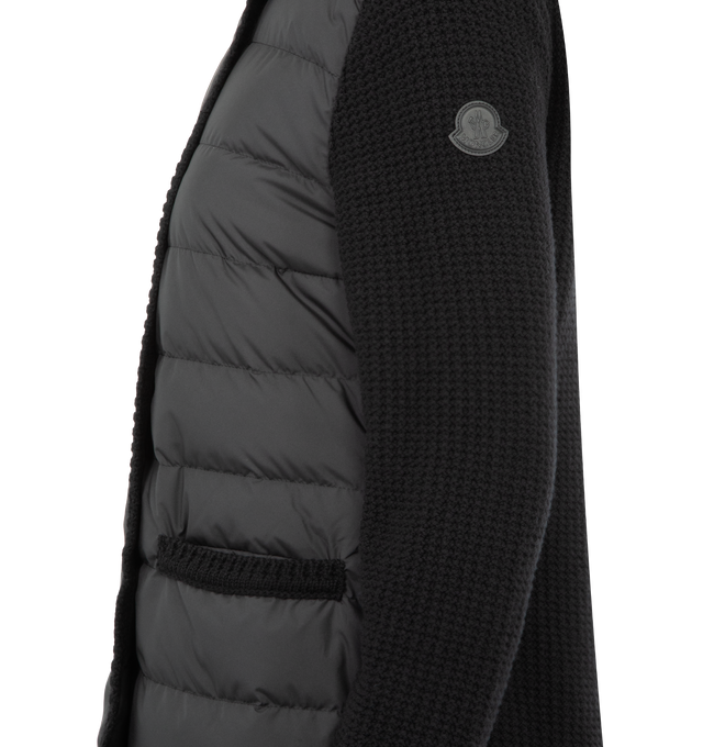 Image 3 of 3 - BLACK - MONCLER Wool & Cashmere Padded Cardigan featuring a wool and cashmere blend, down-filled polyester front, knit trim, waffle stitch, gauge 7, snap button closure, welt pockets and leather logo patch. 100% polyester. 90% virgin wool, 10% cashmere. Padding: 90% down, 10% feather. Made in Moldova.