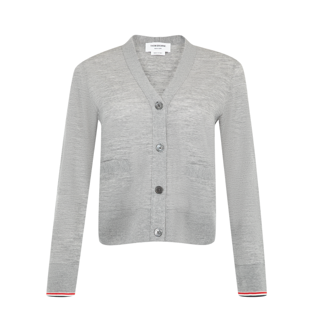 Image 1 of 2 - GREY - Thom Browne Womens Fine Cashmere Cardigan is crafted from fine cashmere jersey and features a front button closure, welt hand pockets, rib-knit cuffs with signature RWB tipping, a rib-knit hem, and the signature striped grosgrain loop tab. This designer cashmere cardigan combines a timeless button-front silhouette with iconic Thom Browne detailing for elevated everyday layering. Main Material: 100% Cashmere. Made in Italy.
