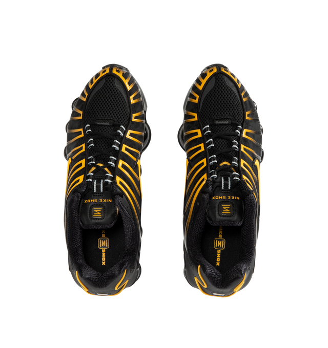 Image 5 of 5 - BLACK - NIKE Shox TL Sneaker featuring Nike Shox technology, a combination upper with a full TPU cage, molded overlays throughout the midfoot, a TPU plate in the heel between the midsole and Nike Shox technology, foam midsole for lightweight cushioning, non-marking, solid rubber in a modified waffle outsole and synthetic and textile upper.