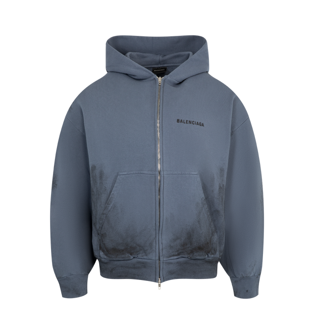 Image 1 of 2 - BLUE - BALENCIAGA Zip-Up Hoodie Regular Fit featuring painted dry fleece, hood without drawstring, zipped front, dropped shoulders, 2 pockets at front, gathered at cuffs and waistline and Balenciaga Back embroidery at front and back. 100% cotton. Made in Portugal.