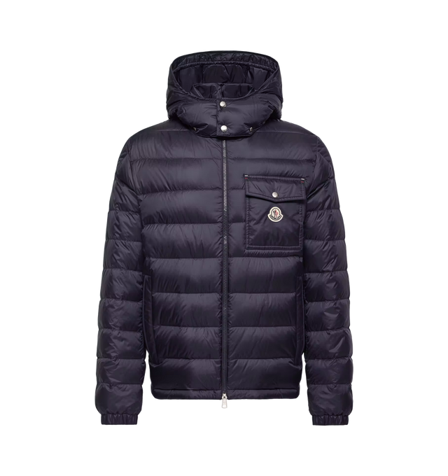 Image 1 of 1 - BLUE - MONCLER Verith Hooded Short Down Jacket featuring nylon technique lining, down-filled, detachable and adjustable hood, zipper closure, zipped pockets, chest pocket with snap button closure, inside pocket with zipper closure, tricolor accent and logo patch. 100% polyamide/nylon. Padding: 90% down, 10% feather.