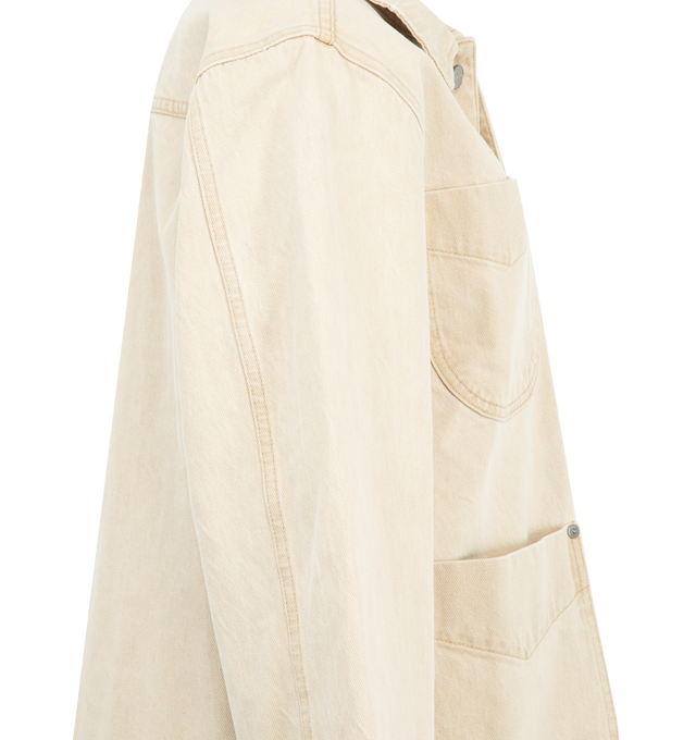 Image 3 of 3 - WHITE - Khaite Wyatt chore coat in robust, tannin-dyed denim. Topstitching traces the quartet of rounded and riveted patch pockets. Finished by hand in Los Angeles with signature buttons of embossed nickel. 100% cotton.