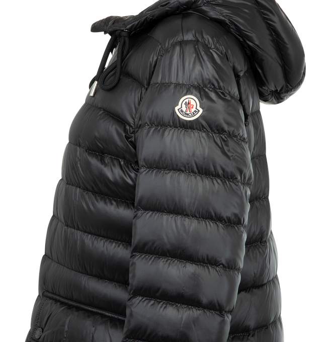 Image 3 of 3 - BLACK - MONCLER Jasmin Hooded Short Down Parka featuring signature embroidered logo patch on the left sleeve, adjustable drawstring hood, long sleeves with elastic cuffs, flap pockets with snap closures, classic fit and two-way zip-front. Nylon/polyamide. Fill: Down/feather. Lining: Polyester.