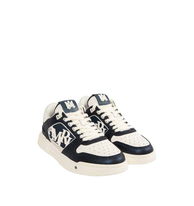Image 2 of 5 - NAVY - AMIRI Classic Low Sneakers featuring low-to, perforated detailing throughout, logo bonded at padded tongue, padded collar, logo appliqu at sides, logo bonded at heel counter, mesh lining and treaded rubber sole. Upper: leather. Sole: rubber.