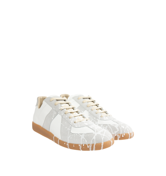 Image 2 of 5 - WHITE - MAISON MARGIELA Replica Sneakers featuring a classic low-top silhouette, contrast of matte leather and a patent sprayed finish, paint splatter detail, lace-up construction and rubber sole. Made in Italy.