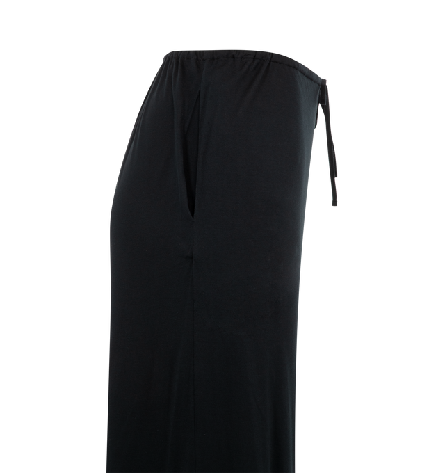 Image 3 of 3 - BLACK - THE ROW Bariem Pants featuring low-rise, straight leg, super soft stretch jersey, elasticated waistband, drawstring tie closure, relaxed fit and raw hem finish. 87% polyamide, 13% elastane. Made in Italy.