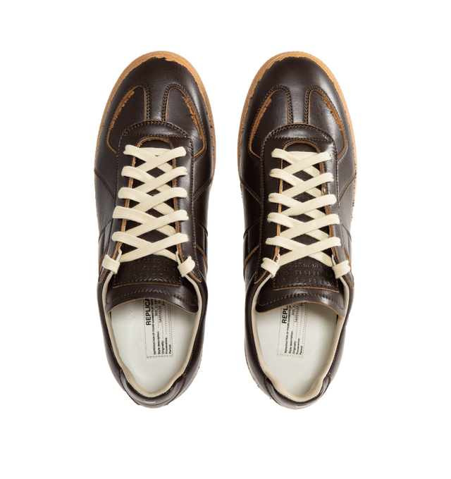 Image 5 of 5 - BROWN - MAISON MARGIELA Replica Sneakers featuring low-top sneakers with distressed contrast overlays, numeric signature tongue, rubber sole with a classic gum finish and white stitching at the back. Upper: 54% Polyamide-Nylon, 46% Polyurethane. Lining: 100% Cotton. Inside: 100% Calf Leather. Made in Italy.