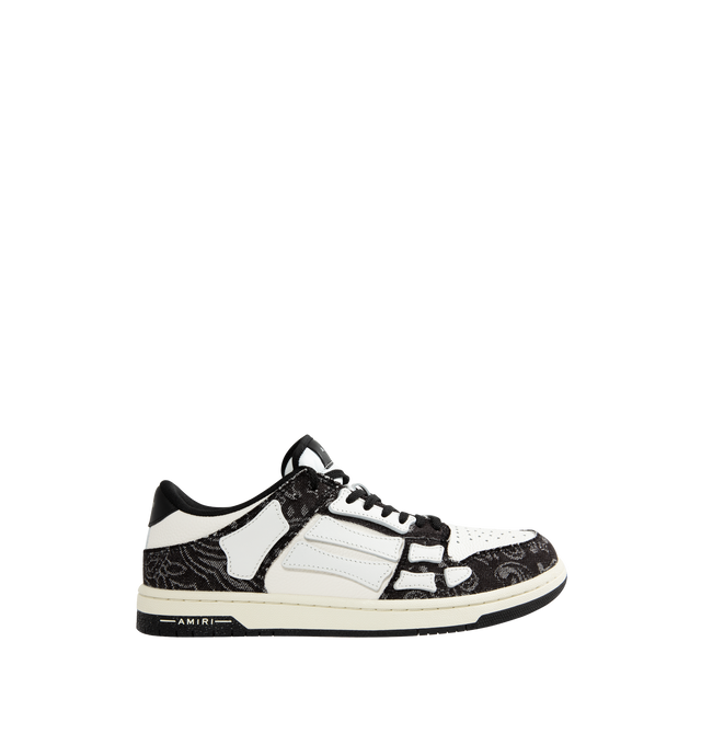 Image 1 of 5 - BLACK - AMIRI Bandana Denim Skel Top Low Sneaker featuring round toe, mesh paneling, logo patch at the tongue, lace up fastening, embossed logo at the side, paneled design and branded insole. Upper: cow leather. Sole: rubber.