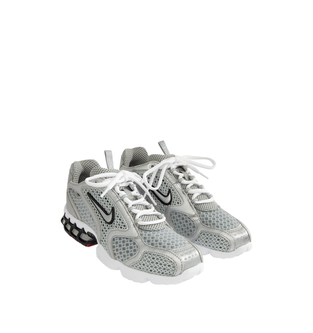 Image 2 of 5 - GREY - NIKE Air Zoom Spiridon Cage 2 Sneaker featuring a caged Zoom Air unit, lightweight flexibility, full-length foam midsole, durable traction, durable rubber pods on the outsole and mesh upper.