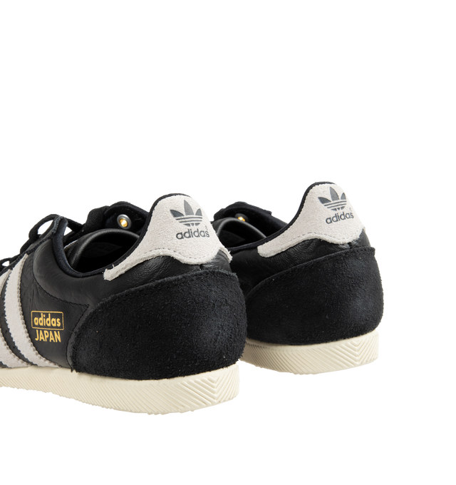 Image 3 of 5 - BLACK - ADIDAS Japan Sneakers are a lace-up style with leather uppers, EVA midsoles, molded heels, and rubber gum soles. Reissued vitage design from a 1964 trainer that appeared in a catalog for that year's global sporting event held in Japan. Unisex style in men's sizes.