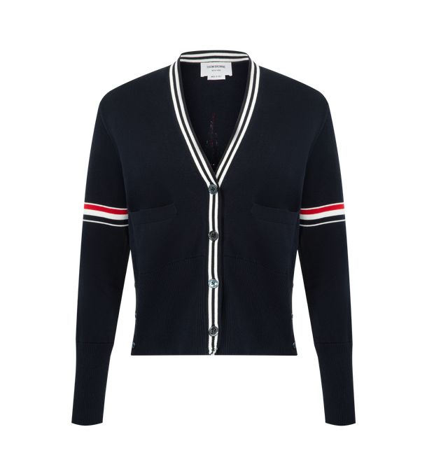 Image 1 of 3 - NAVY - THOM BROWNE Jacquard Sailboat Cardigan featuring V-neckline with striped trim, front button closure, welt hand pockets with ribbed trim, RWB intarsia armbands, ribbed buttoned cuffs and side vents with internal RWB grosgrain trim, ribbed hem, sailboat intarsia on back and signature striped grosgrain loop tab. 100% cotton. Made in Italy.