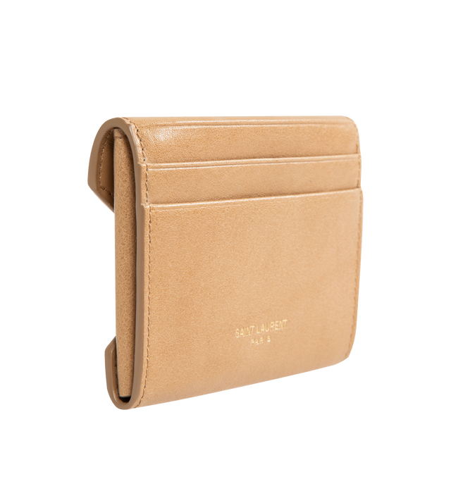 Image 2 of 3 - BROWN - SAINT LAURENT Letter Card Case in leather featuring card holder with flap decorated with the SAINT LAURENT PARIS signature, leather lining, bronze-tone hardware and snap-button closure. 3.9" x 2.8" x 0.2". Calfskin. Made in Italy.