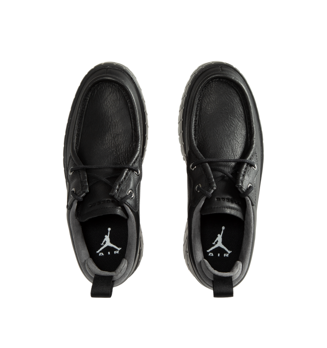 Image 5 of 5 - BLACK - Air Jordan 1 Brooklyn Low Women's Shoes combine smooth leather construction with a bold platform silhouette, featuring exaggerated outsole lugs and lightweight Nike Air cushioning for all-day comfort. Rooted in the heritage of the original AJ1, this elevated design is finished with Jumpman branding on the insole, blending iconic basketball DNA with a modern fashion-forward look. Main Material: Smooth Leather. Cushioning: Nike Air.