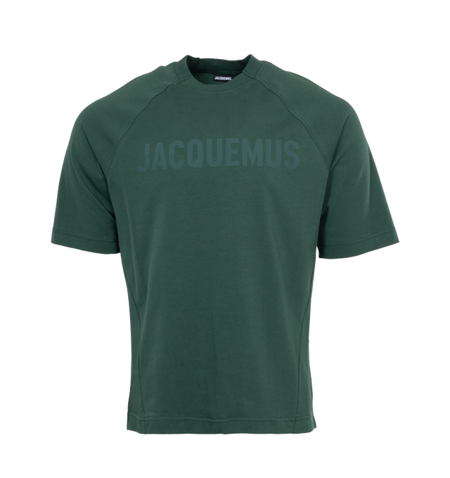 Image 1 of 2 - GREEN - JACQUEMUS LE TSHIRT TYPO is a raglan logo t-shirt with a relaxed fit, partially ribbed crew neck, elbow-length raglan sleeves and logo on the chest. 90% cotton. 10% elastane. 