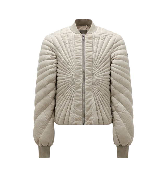 Image 1 of 1 - BROWN - MONCLER + RICK OWENS FW23 Radiance Flight Jacket in airy, lightweight duvet fabric with below waist length. Featuring a visible central zipper, side pockets with snap closure, internal zippered pockets, ribbed collar and cuffs, an exclusive Rick Owens Radiance stitching design all over, cotton webbing strap with rivet detail accross the back yoke and a small Moncler + Rick Owens logo on the left sleeve. LINING: 100% Polyester PADDING: 90% Down, 10% Feather DETAILS PADDING: 100% Polyes 