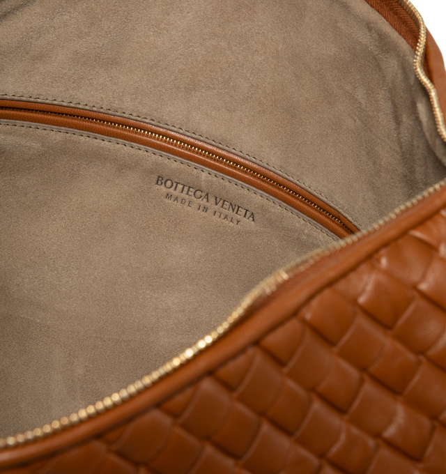Image 3 of 3 - BROWN - Bottega Veneta Maxi Veneta Bag featuring maxi padded Intrecciato supple leather shoulder bag with single compartment, one zipped pocket, zip closure and suede lining. Lambskin. Made in Italy. This item may be restricted for online purchase to international clients. For assistance purchasing this item please contact our dedicated stylist team at personalshopping@hirshleifers.com.