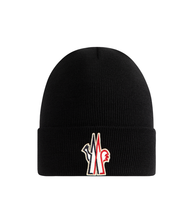 Image 1 of 2 - BLACK - MONCLER Wool Beanie featuring ultra-fine wool, rib knit and gauge 7. 100% virgin wool. Made in Italy.