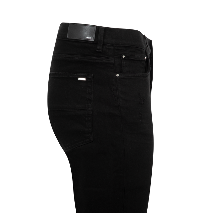 Image 3 of 3 - BLACK - AMIRI Stack Jeans are a 5-pocket style with a button fly. Cotton and elastane. Made in USA.