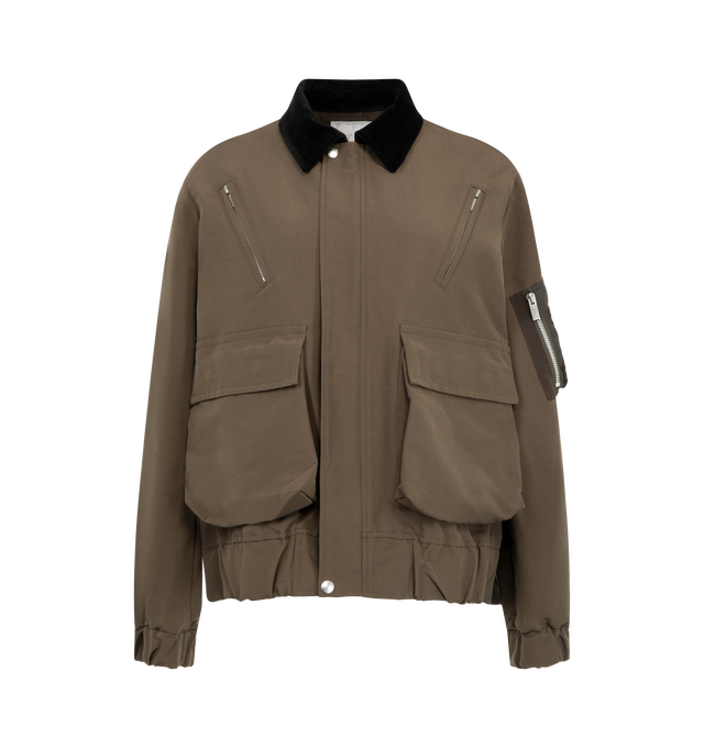 Image 1 of 4 - BROWN - Sacai Women's Grosgrain Bonding Blouson Jacket features distinct oversized front flap pockets, angled chest zip pockets, a contrasting collar, and an adjustable buttoned placket overlay. Materials: Nylon Exterior; Cotton.