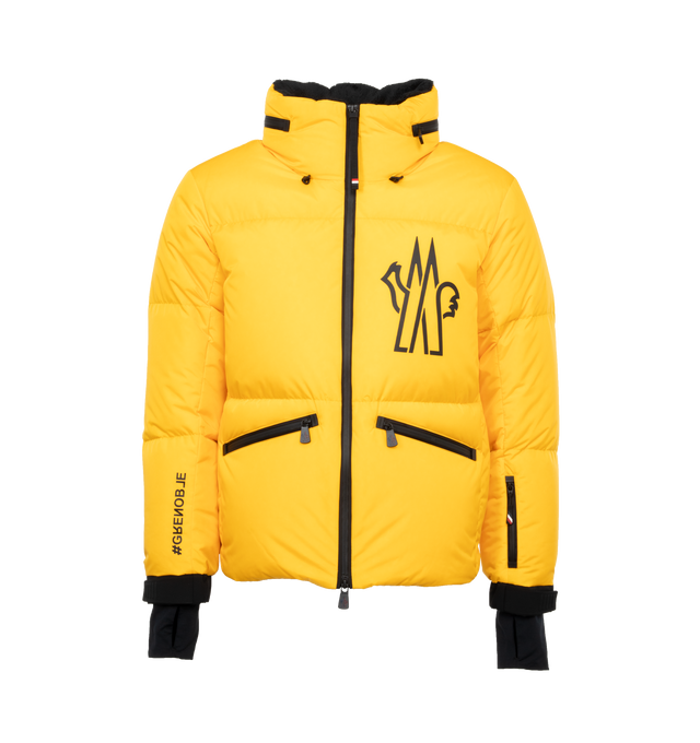 Image 1 of 6 - YELLOW - MONCLER GRENOBLE VERDONS JACKET featuring micro ripstop lining, down-filled, pull-out hood with visor, collar with fleece inner, water-repellent look zipper closure, water-repellent look zipped pockets, inner media pocket, ski pass pocket, windproof powder skirt, jersey wrist gaiters, adjustable cuffs and logo details. 100% polyamide/nylon. Padding: 90% down, 10% feather. 