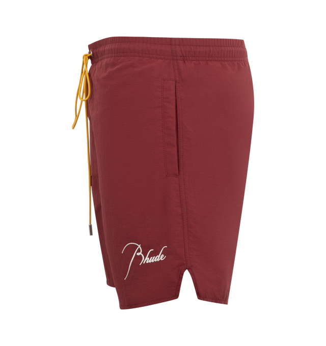 Image 3 of 3 - RED - RHUDE Radiator Swim Shorts featuring elasticated drawstring waist, side slip pockets, logo embroidery, back patch pocket, curved hem, internal mesh brief lining and pull on. 100% polyester. Lining: 85% nylon, 15% spandex.