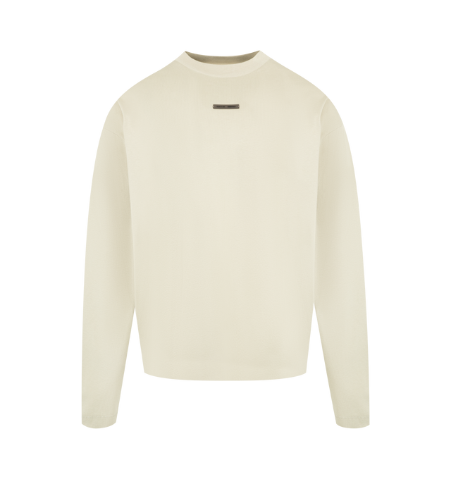 Image 1 of 2 - WHITE - FEAR OF GOD ESSENTIALS Classic Long Sleeve Tee made from medium-weight 100% cotton jersey featuring a classic fit with signature Fear of God relaxed proportions for everyday wear. Branding includes a Fear of God Essentials rubberized label at the center front and a new "Essentials Fear of God" beveled metallic logo across the back. 100% cotton.