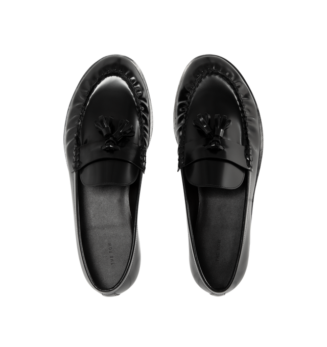 Image 4 of 4 - BLACK - THE ROW Loafers featuring tassel detail at strap, ruched welt stitching and box calf leather upper and sole. Made in Italy.
