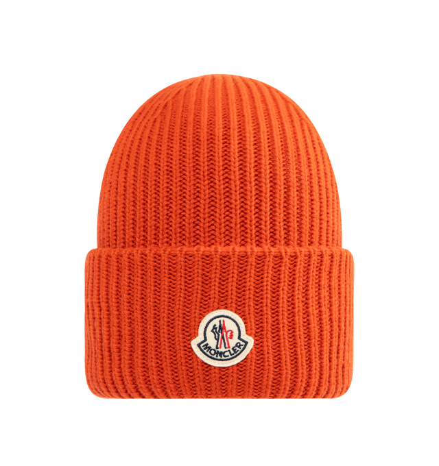 Image 1 of 2 - ORANGE - MONCLER Beanie featuring a wool and cashmere blend, brioche stitch, gauge 3 and a felt logo patch. 70% virgin wool, 30% cashmere. Made in Italy.