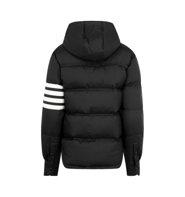 Image 2 of 3 - BLACK - THOM BROWNE Shiny Ripstop Lightweight Jacket featuring a lightweight, weather-resistant fabric, a shirtdress-inspired hem, front snap closure, drawstring hood with matte RWB-detailed aglets, patch chest pocket, welt hand pockets with snap, interior button pocket, snap-fastening cuffs, plain back yoke with locker loop, curved hem, tricolor lining, 4-bar detailing, name tag appliqu and signature striped grosgrain loop tab. 81% polyamide, 19% polyester. 80% white goose down, 20% white go
