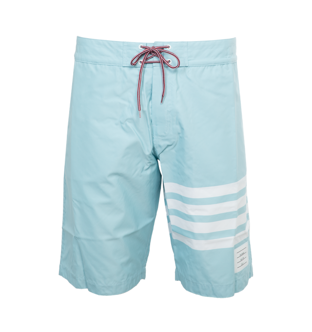 Image 1 of 3 - BLUE - THOM BROWNE Board Shorts have a drawstring waist, 4 bar detail on the left thigh, single flap back pocket, slant side pockets, and name tag above the left cuff. 94% polyamide, 6% polyurethane. Lining: 100% polyester. Made in Itlay.  