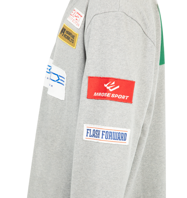 Image 4 of 4 - GREY - MARTINE ROSE Rugby Polo featuring cotton jersey, text and logo patches throughout, denim spread collar, concealed three-button placket, vented side seams, rib-knit cuffs and logo printed at back. 100% cotton. Made in Portugal.
