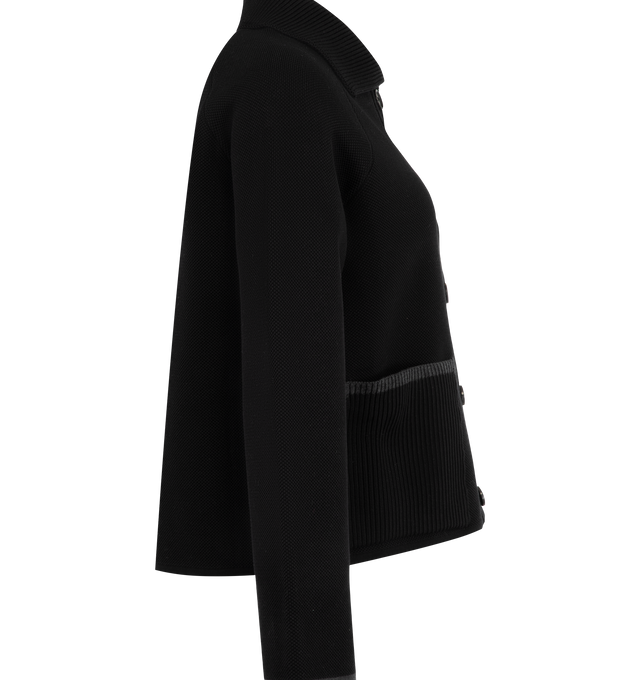 Image 3 of 3 - BLACK - Thom Browne Womens Double-Face Piqu Stitch Polo Collar Jacket is crafted from a virgin wool and cotton blend double-face piqu knit and features a rib-knit polo collar, front button closure, raglan sleeves, rib-knit patch pockets with contrast tipping, rib-knit cuffs and hem, signature 4-bar detailing, internal RWB grosgrain trim, and the signature striped grosgrain loop tab. Main Material: 50% Virgin Wool, 47% Cotton, 3% Polyamide. Made in Italy.