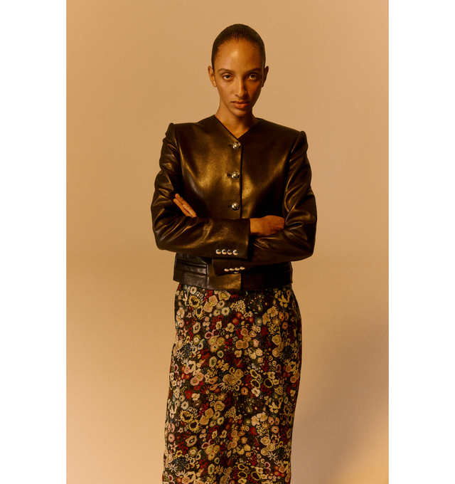 Image 2 of 4 - BLACK - KHAITE Nara Jacket featuring a collarless, high-necked jacket shaped by soft peplum contouring, reinforced shoulder pads, single-breasted silhouette, cropped fit, faux pockets and cupro twill lining. 100% lamb.