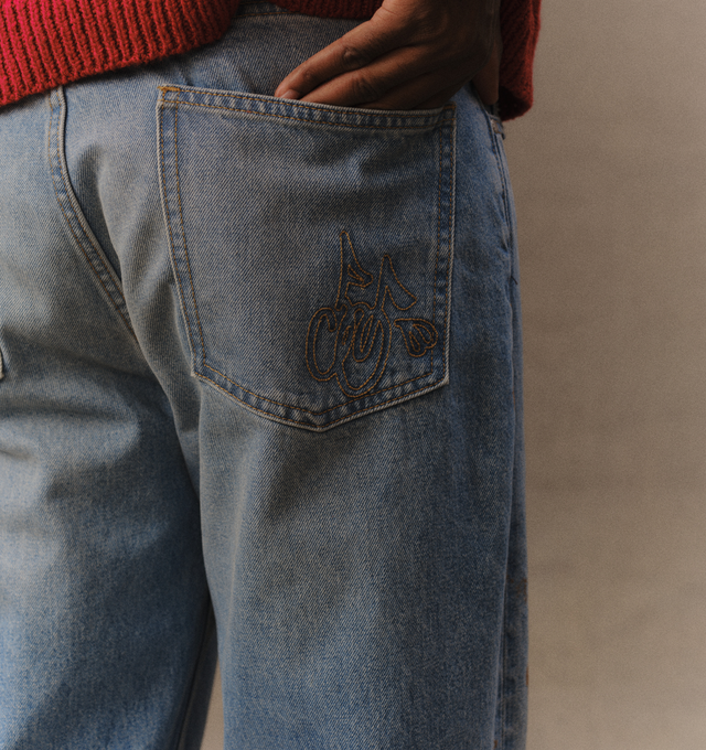 Image 8 of 8 - BLUE - Cherry LA Men's Wide Leg 5 Pocket Jeans are crafted from cotton denim and features a wide-leg silhouette with classic five-pocket construction. Designed with branded nickel hardware and a signature suede logo patch at the back, this everyday style combines relaxed proportions with timeless denim detailing. Main Material: Cotton Denim. Made in Los Angeles, California.