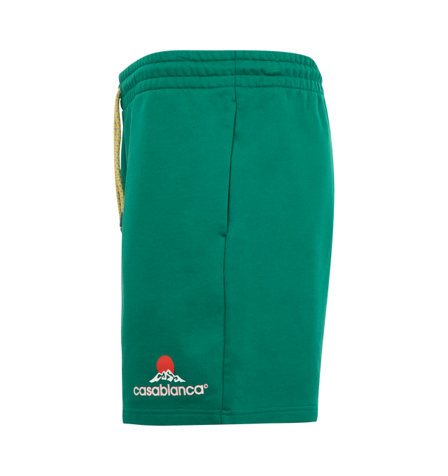 Image 3 of 3 - GREEN - CASABLANCA Montagne Sweat Shorts featuring organic cotton French terry, drawstring at elasticized waistband, three-pocket styling and logo graphic bonded at front hem. 100% organic cotton. Made in Portugal.