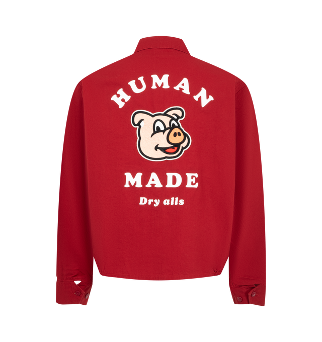 Image 2 of 3 - RED - Human Made Men's Work Jacket is crafted from thick, firm cotton twill and features a wide, boxy silhouette inspired by classic workwear. Designed with a front zip closure, the jacket is finished with a pig graphic patch on the back, a chain-stitched Human Made logo at the left chest, and signature heart buttons at the cuffs. Main Material: 100% Cotton. Lining: 100% Polyester. Decoration: 100% Cotton.