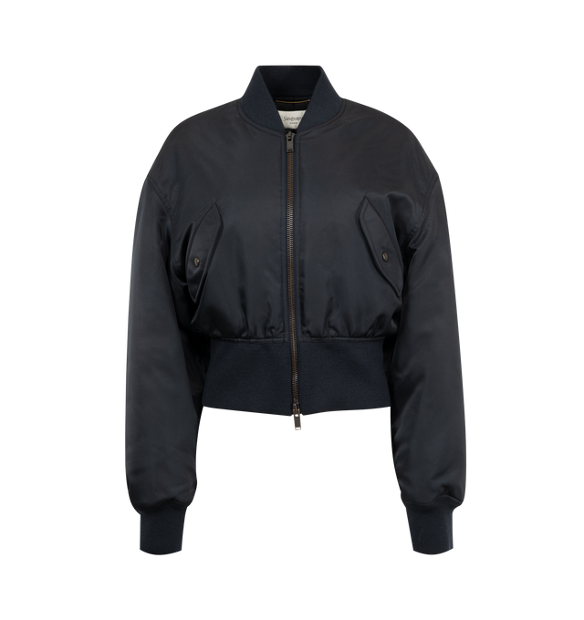Image 1 of 3 - BLUE - SAINT LAURENT Bomber Jacket in nylon featuring cropped fit, padded, drop shoulders, rib-knit trims, fitted waist, silk lining, front zip closure, two jetted pockets with snap-button flap at the front and one inner welt pocket. 100% polyamide. Made in Italy.
