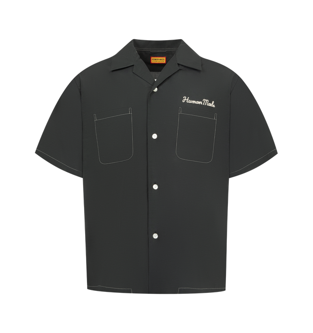Image 1 of 2 - BLACK - HUMAN MADE Souvenir Shirt featuring a camp collar, button up closure and chest pockets with contrast stitching. 100% cotton.