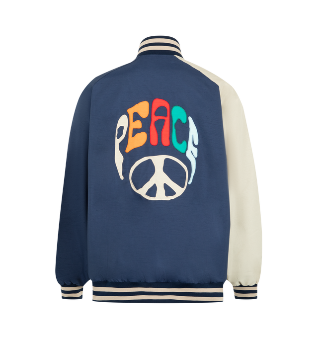 Image 2 of 3 - NAVY - NEEDLES Stadium Jacket in poly shantung featuring embroidered logo to the front, peace sign patch to the rear, contrast-colour long sleeves, press-stud fastening, striped ribbed collar, striped ribbed cuffs and hem, butterfly embroidery at the cuff and two side welt pocket. 100% polyester.