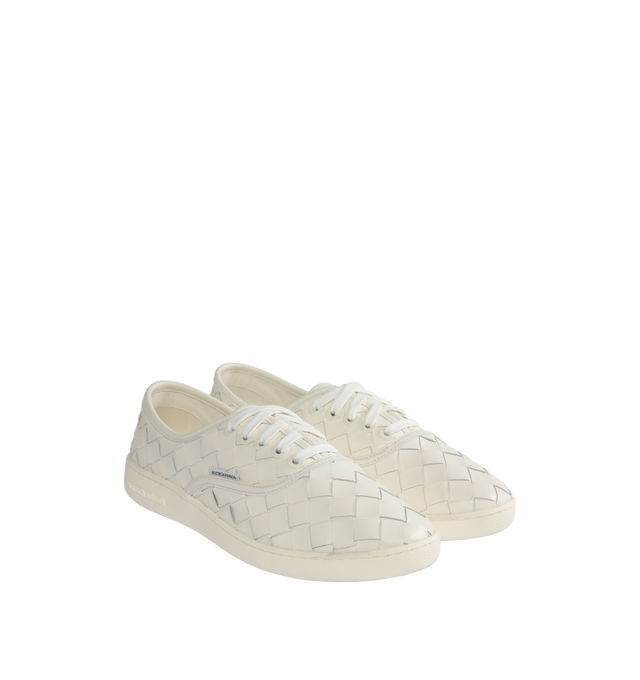 Image 2 of 5 - WHITE - BOTTEGA VENETA Sawyer Sneakers featuring lace-up closure, logo flag at side, buffed calfskin and suede lining, logo embossed at textured rubber midsole and treaded rubber sole. Upper: calfskin. Sole: rubber. Made in Italy. 