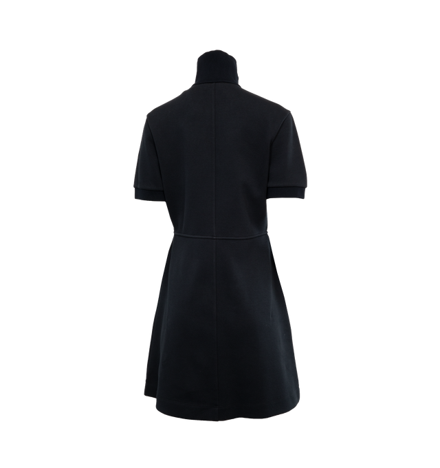 Image 2 of 3 - NAVY - MONCLER Polo Dress featuring rib knit collar, zipper closure and flap pockets with snap button closure. 57% cotton, 38% polyester, 5% elastane/spandex. 