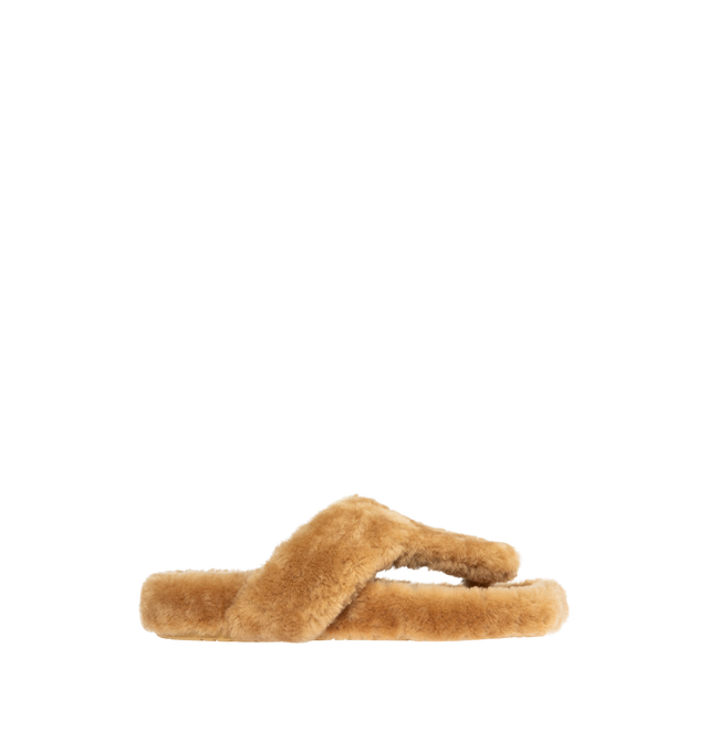 Image 1 of 4 - BROWN - LOEWE Ease Shearling Thong Sandals featuring thong strap, slide style and sheep shearling. Made in Italy.  
