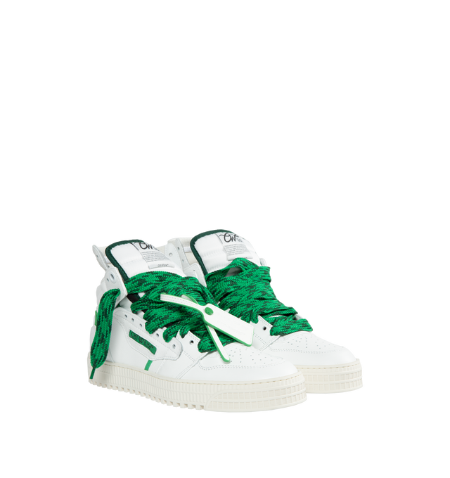 Image 2 of 5 - WHITE - OFF-WHITE 3.0 OFF COURT CALF LEATHER are high top "Off-Court" 3.0 sneakers in white with Off-White logo on one side. Green and black labels detailing. White rubber sole. Green and black lace-up closure. Outer: 30% Cotton Outer: 55% Leather Outer: 10% Polyamide Outer: 4% Polyester Sole: 100% Rubber Outer: 1% Elastane 