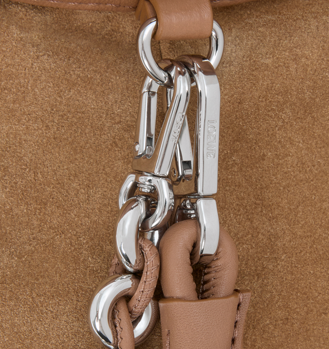 Image 6 of 6 - BROWN - LOEWE Medium Flamenco Purse featuring a lightweight and soft bag with a ruched shape, historical knot drawstrings, shoulder, crossbody or hand carry, detachable donut chain with Anagram Pebble, detachable and adjustable leather strap, magnetic closure, suede lining and embossed LOEWE. Mellow nappa lambskin. 20 cm x 30 cm x 10.5 cm. Made in Spain.