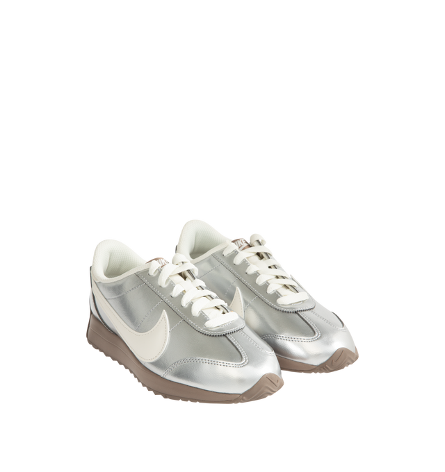 Image 2 of 5 - SILVER - NIKE Pacific Sneaker featuring synthetic leather upper with a metallic finish, wide collar opening, herringbone gum sole with flex grooves, puffed Swoosh logo and foam midsole.