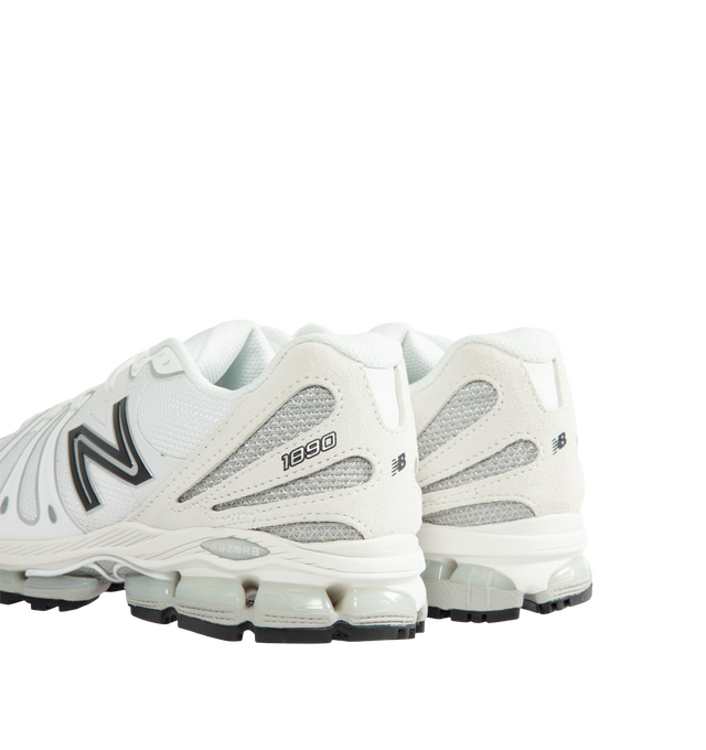 Image 3 of 5 - WHITE - New Balance 1890 Unisex Sneakers feature a synthetic upper with a classic lace-up silhouette. Designed with ABZORB midsole cushioning for enhanced impact absorption, all-day comfort, and a durable rubber outsole. Upper: Synthetic; Midsole: ABZORB. *Unisex style in men's sizing.