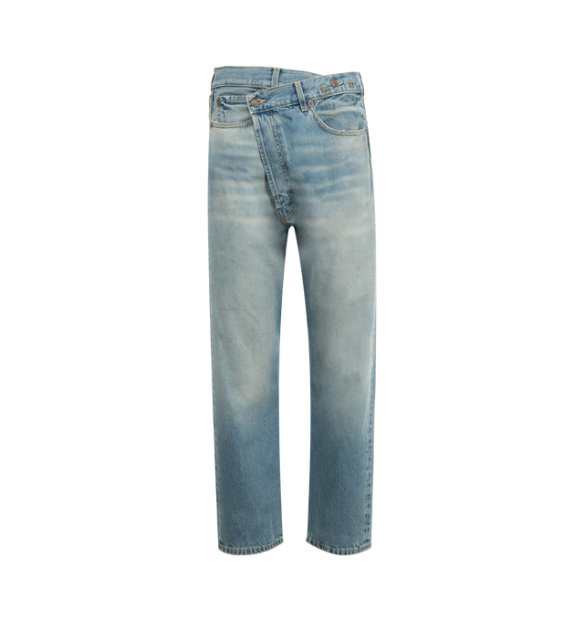 Image 1 of 3 - BLUE - R13 Crossover Jeans featuring fading, whiskering, and distressing throughout, belt loops, five-pocket styling, offset button-fly, raw edge at rolled cuffs and logo patch at back waistband. 100% cotton. Made in Italy.