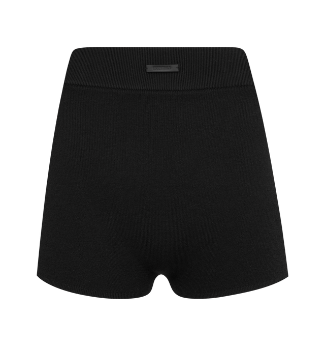 Image 1 of 3 - BLACK - FEAR OF GOD ESSENTIALS Rib Boy Short featuring a poly-nylon rib knit, a cropped silhouette and rib-knit elastic waistband with the new Fear of God rubberized label. 88% polyester, 12% nylon rib knit.