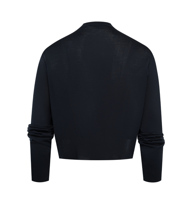 Image 2 of 3 - NAVY - KHAITE Nadyne Cardigan featuring a finely knit cardigan, compact, jersey-stitched silhouette, side slits, button front closure and 1x1 ribbing at the crewneck, bracelet-length sleeves, and hem. 95% silk, 4% polyamide, 1% polyurethane.