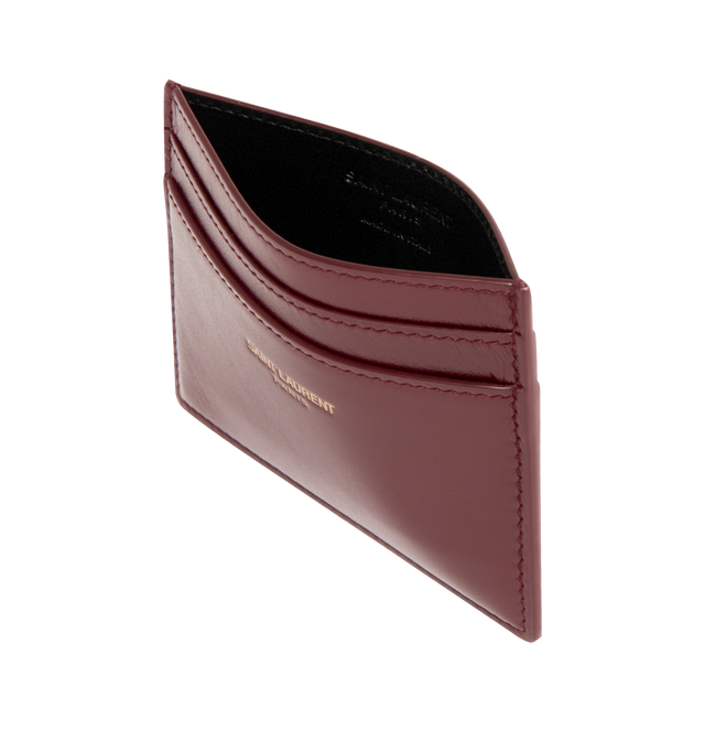Image 3 of 3 - RED - SAINT LAURENT Card Case in shiny leather featuring leather lining, bronze-tone hardware and five card slots. 4.1" X 1.8" X 0.2". Calfskin. Made in Italy.